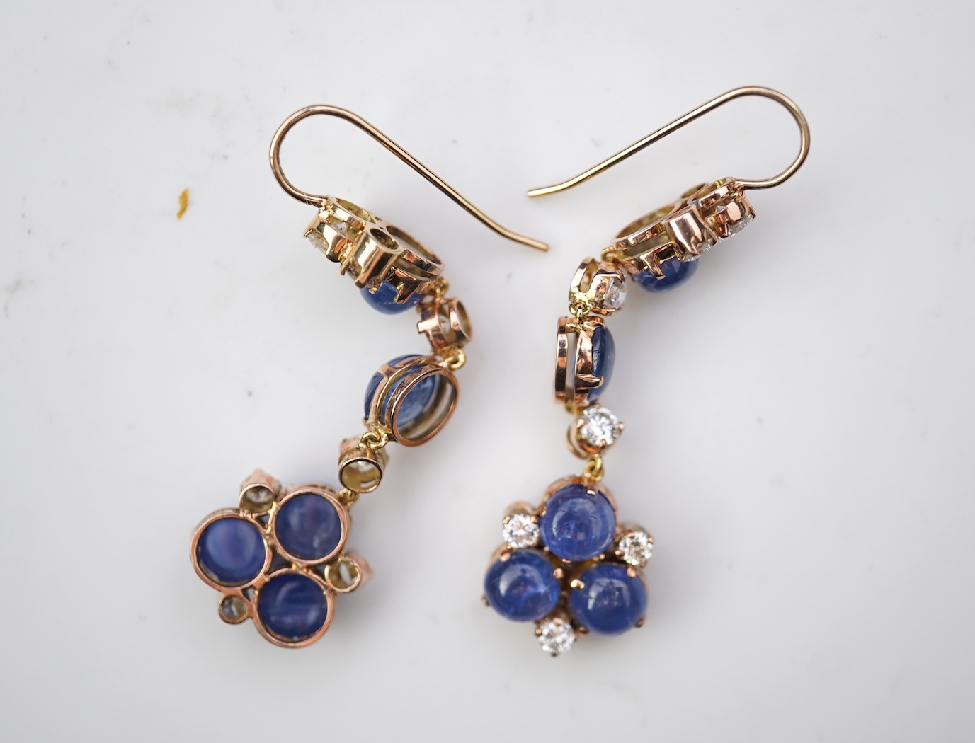 A pair of sapphire and diamond drop earrings